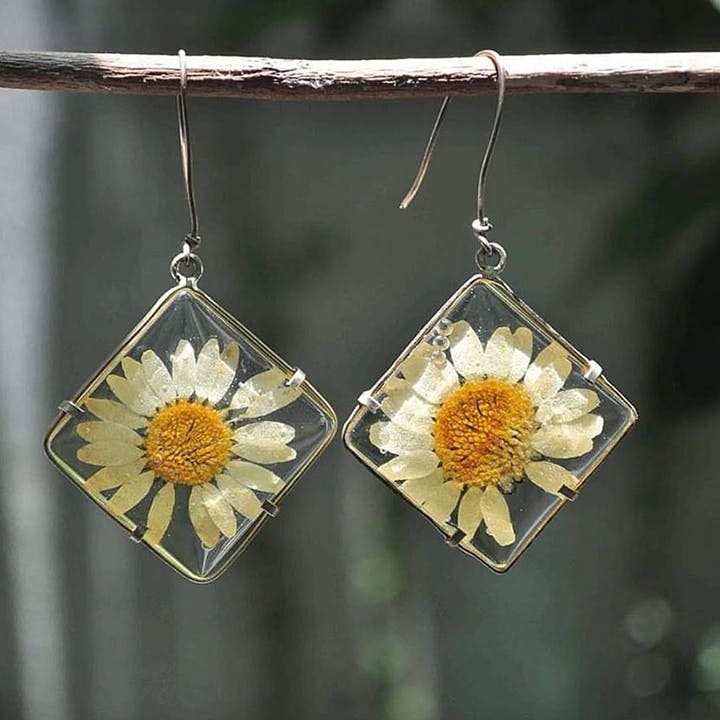 Earrings,Yellow,Flower,Jewellery,Dandelion,Plant,Fashion accessory,Petal,Daisy family,Metal