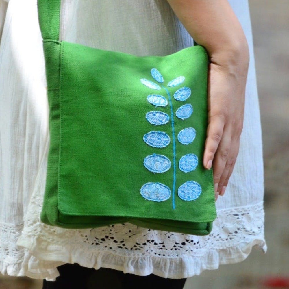 Green,Bag,Pattern,Design,Hand,Textile,Handbag,Pattern,Fashion accessory,Plant
