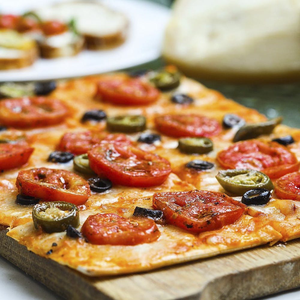 Dish,Food,Cuisine,Ingredient,Flatbread,Pizza,Italian food,Pizza cheese,Produce,Recipe