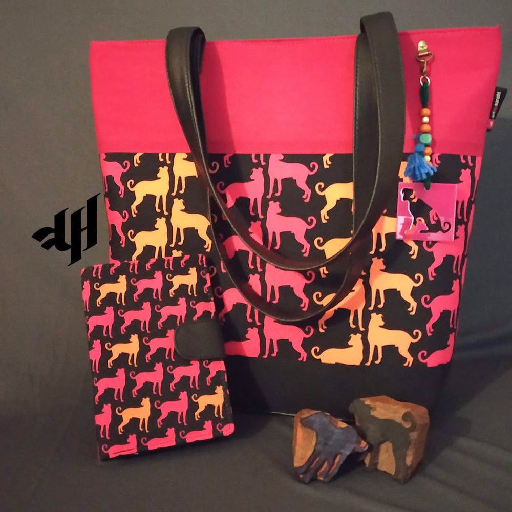 Bag,Handbag,Shopping bag,Pink,Tote bag,Fashion accessory,Diaper bag,Material property,Font,Paper bag