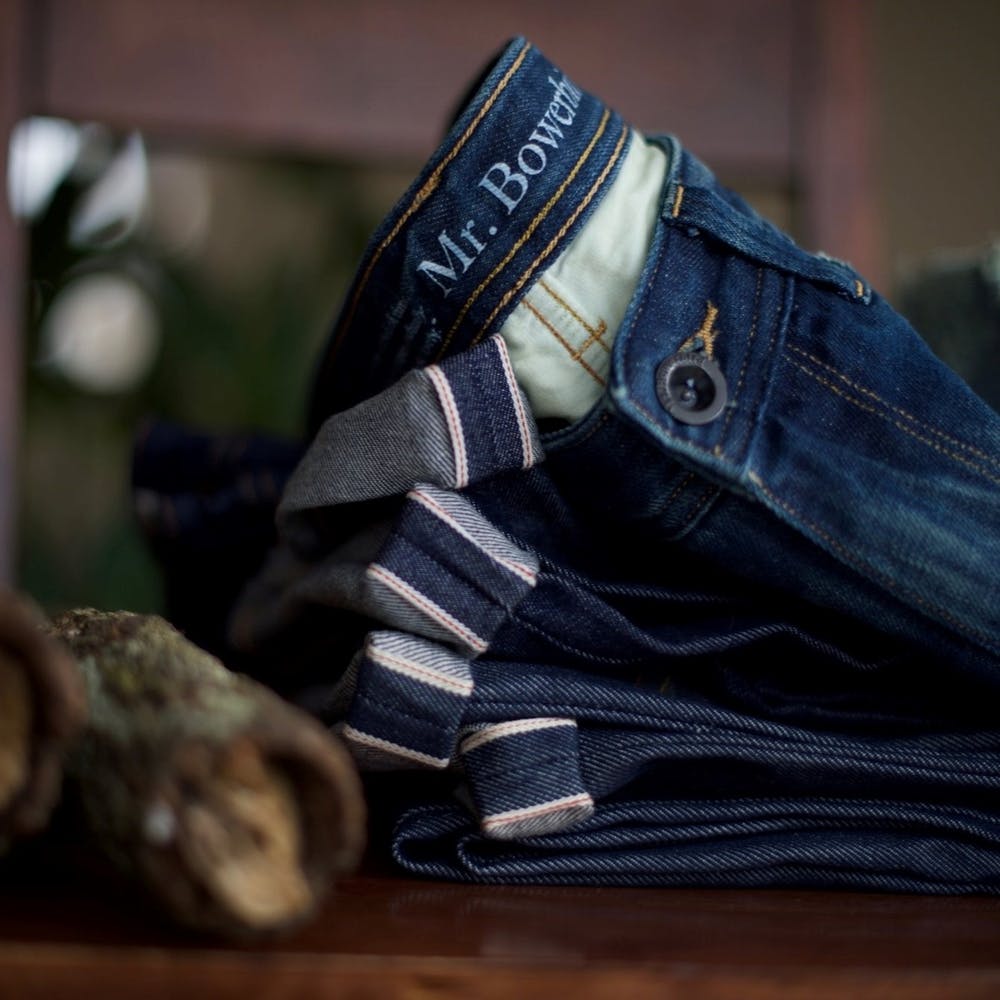 Jeans,Denim,Blue,Textile,Pocket,Footwear,Shoe,Hand,Trousers,Photography
