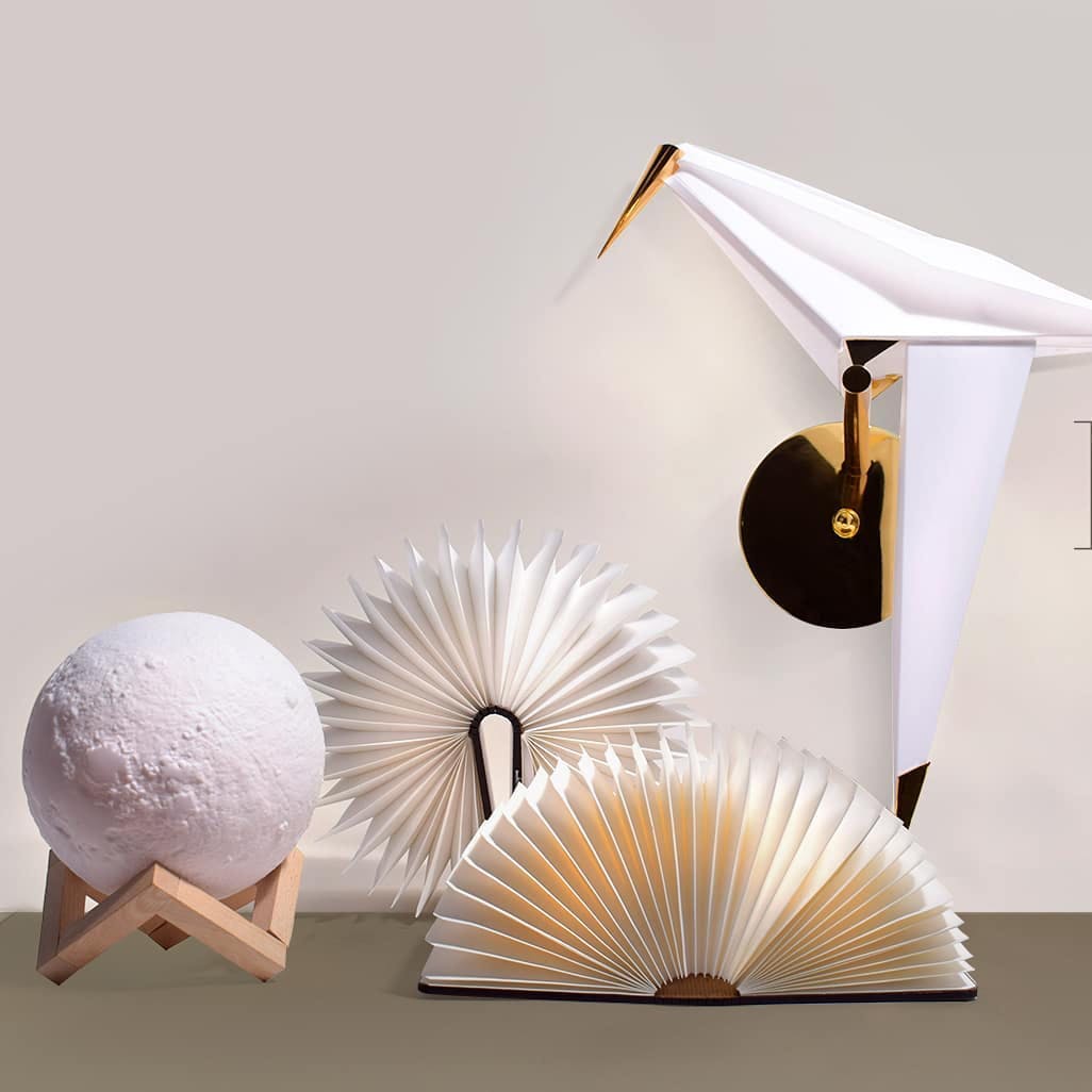 Decorative fan,Umbrella,Hand fan,Furniture,Lamp,Fashion accessory,Shell,Beige