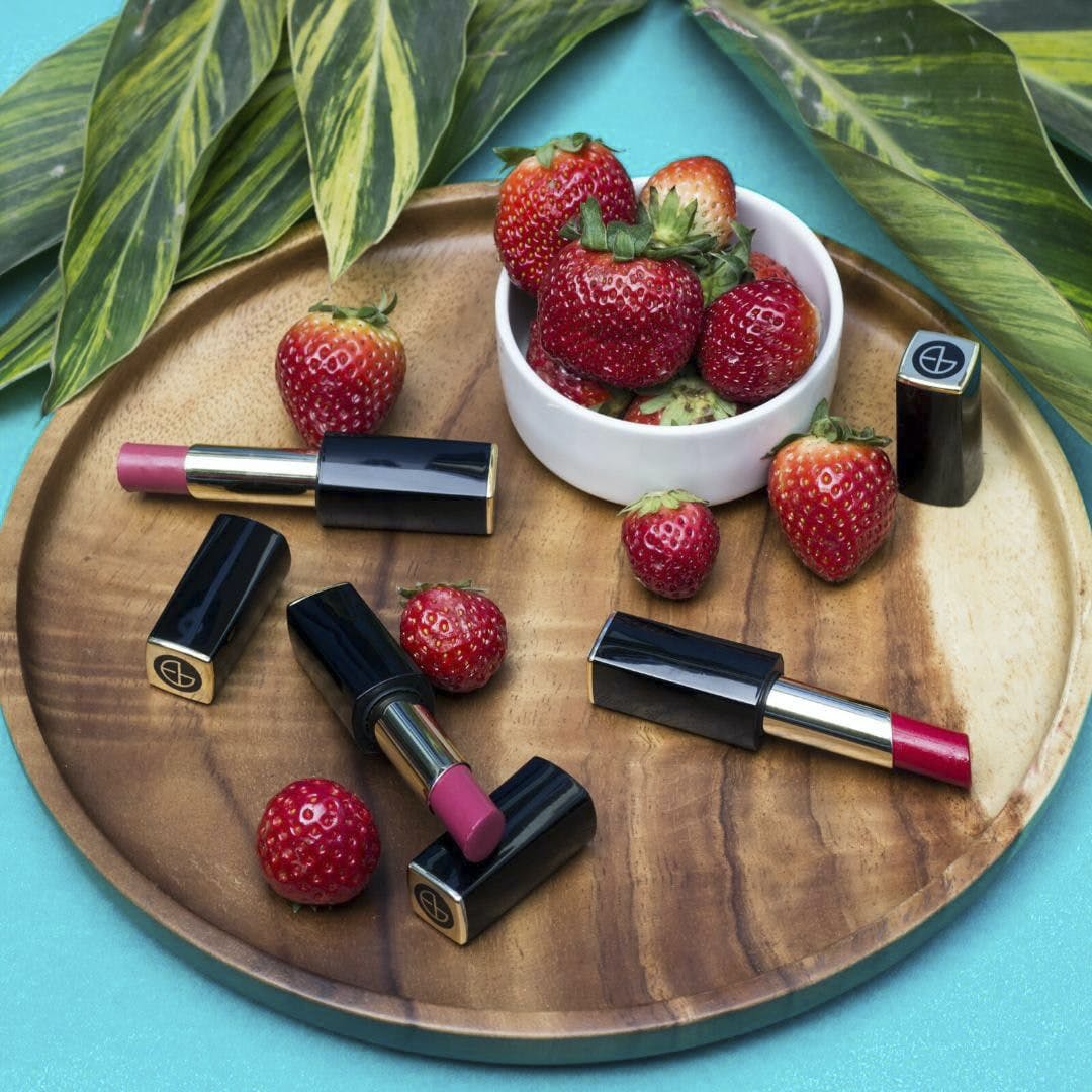 Cosmetics,Fruit,Food,Lip,Plant,Material property,Lip gloss,Berry,Strawberry,Room