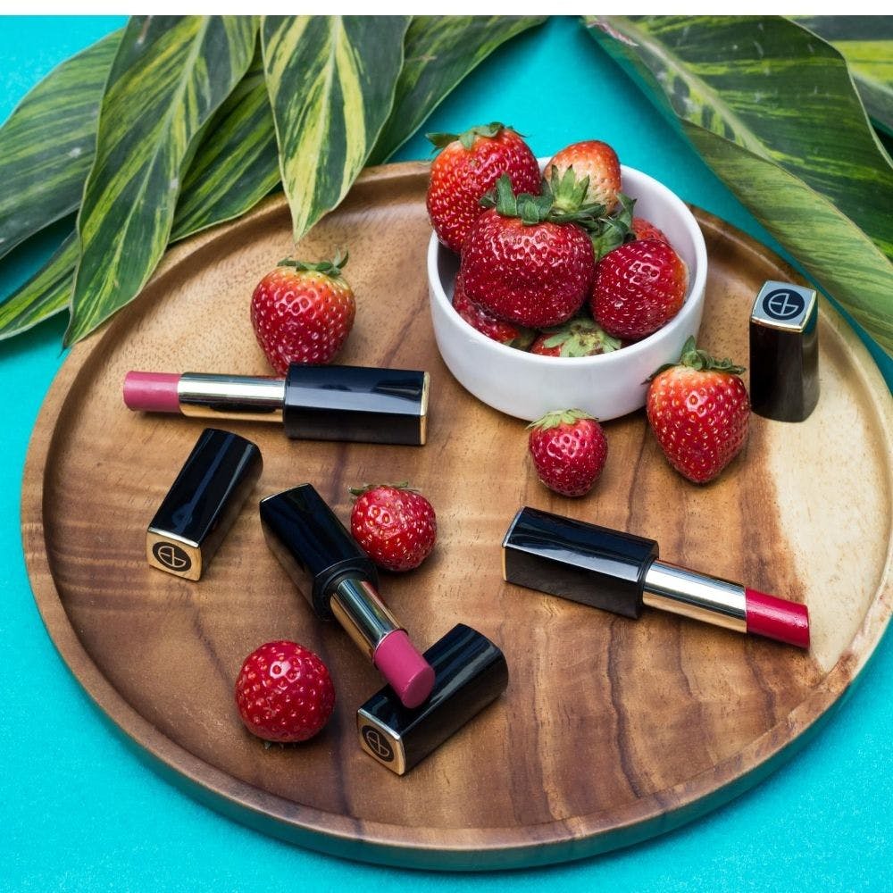 Fruit,Food,Berry,Strawberry,Plant,Material property,Cosmetics,Lip gloss,Strawberries,Produce