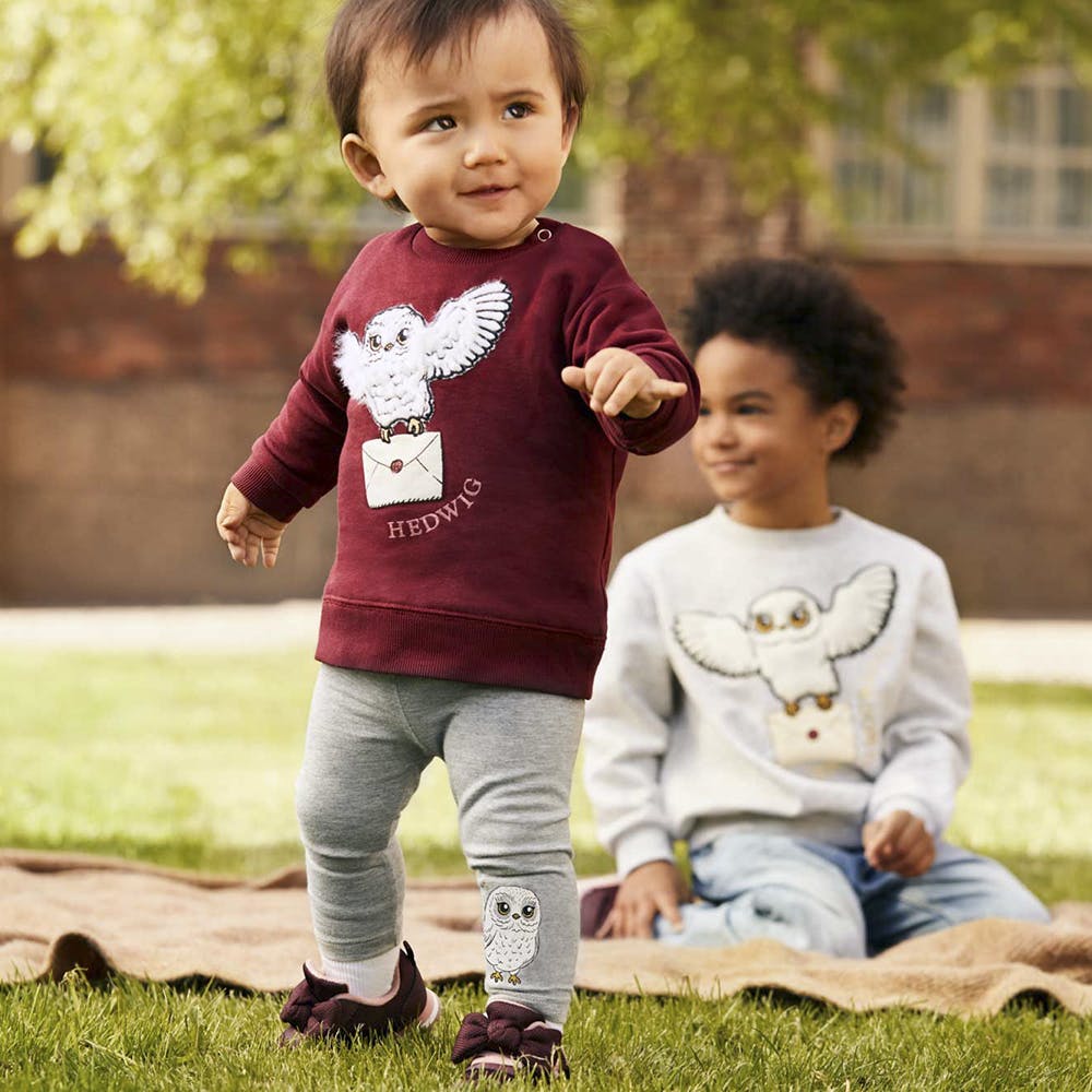 Child,People,Toddler,Grass,Sleeve,Baby,T-shirt,Smile,Outerwear,Baby & toddler clothing