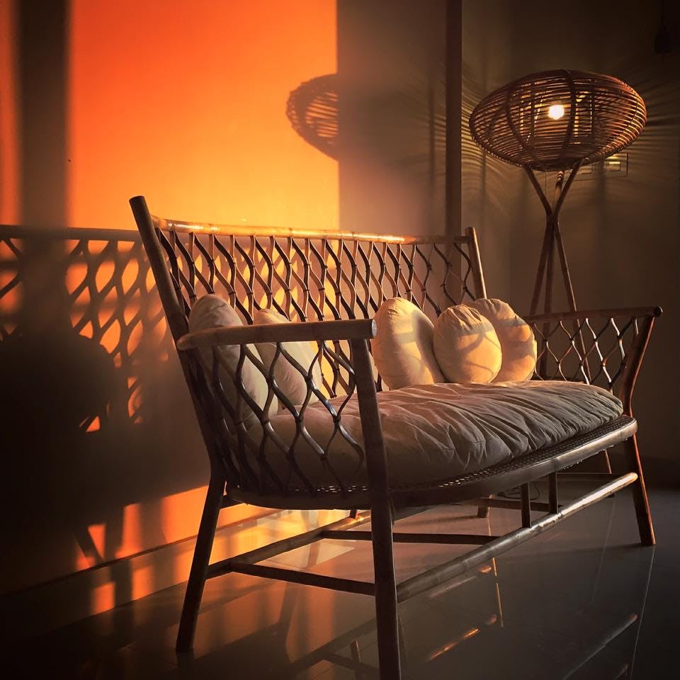 Furniture,Chair,Room,Lighting,Interior design,Orange,Table,Floor,Design,Couch