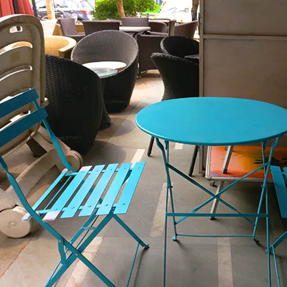 Furniture,Chair,Blue,Table,Turquoise,Folding chair,Outdoor table,Room,Design,Interior design