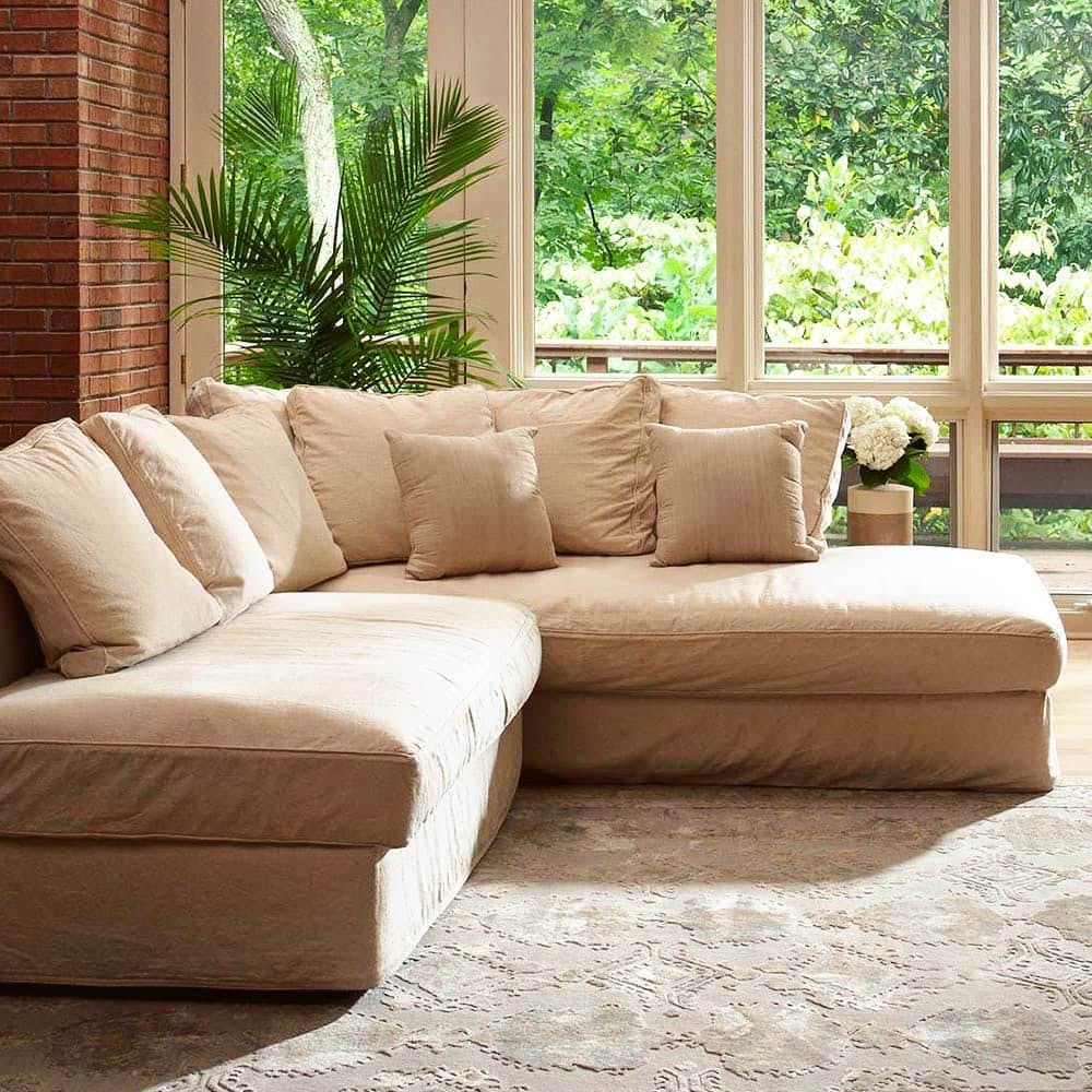 Furniture,Couch,Living room,Room,Property,Sofa bed,Floor,Brown,Interior design,Beige