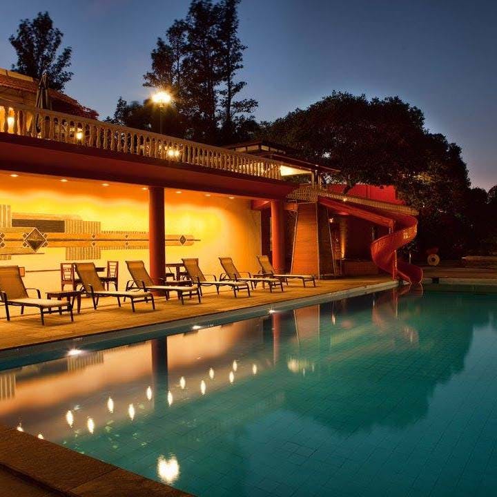 Swimming pool,Property,Home,House,Resort,Lighting,Sky,Real estate,Estate,Building