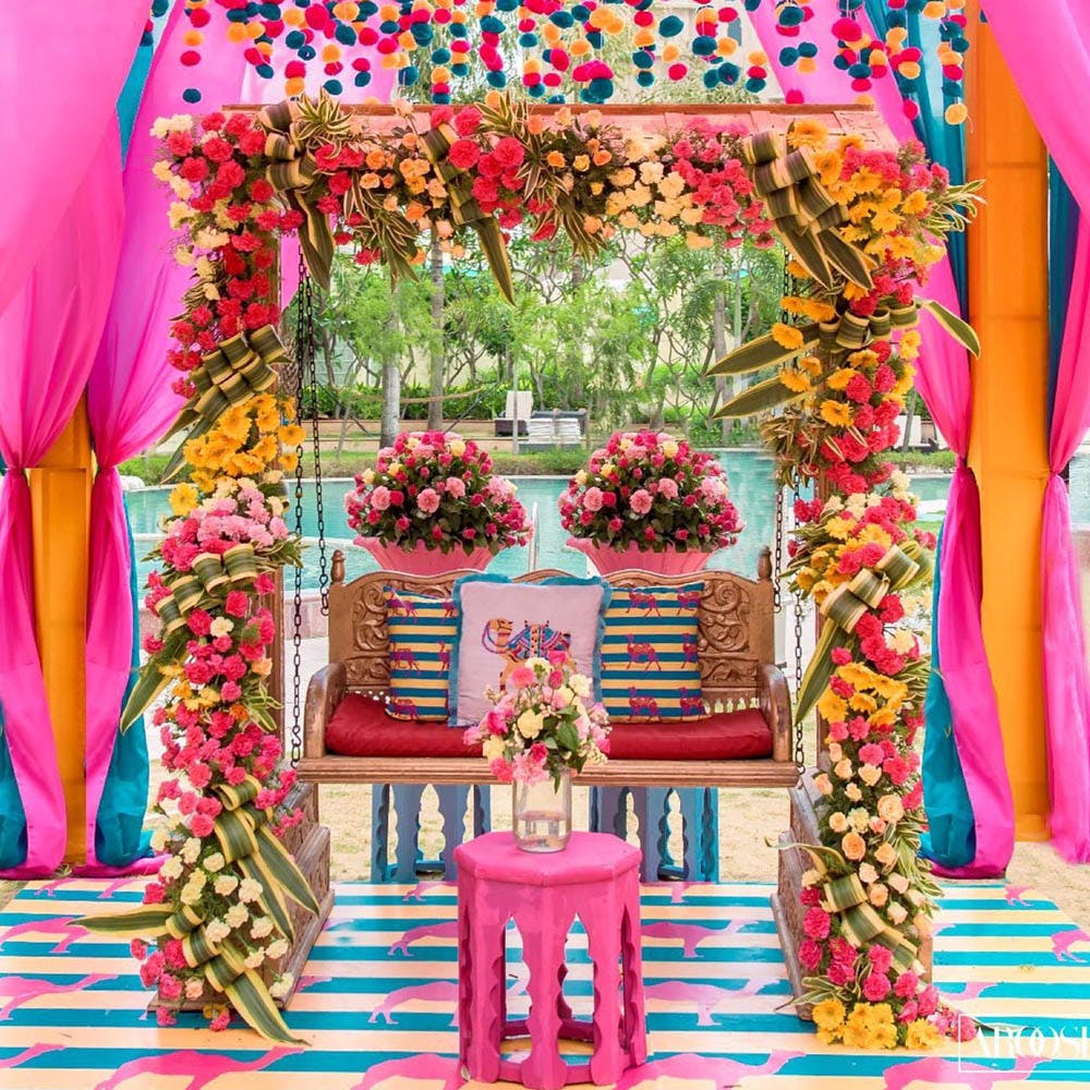 Decoration,Pink,Magenta,Ceremony,Plant,Party,Interior design,Furniture,Chair
