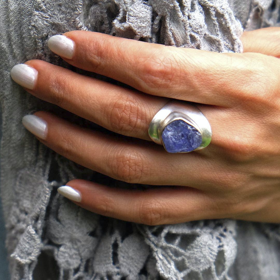 Nail,Ring,Hand,Finger,Fashion accessory,Silver,Jewellery,Material property,Electric blue,Gemstone