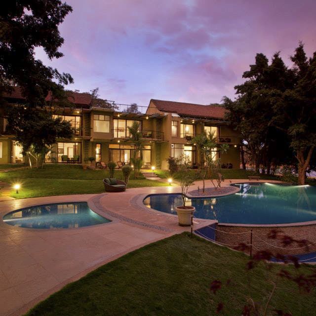 Property,Home,Estate,Swimming pool,Lighting,Real estate,Residential area,Building,House,Mansion