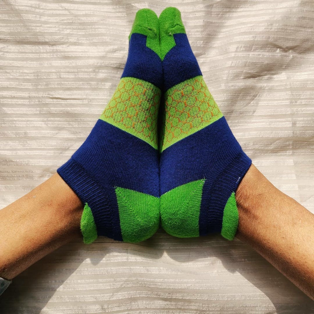 Green,Blue,Wool,Glove,Hand,Ankle,Joint,Fashion accessory,Finger,Wrist