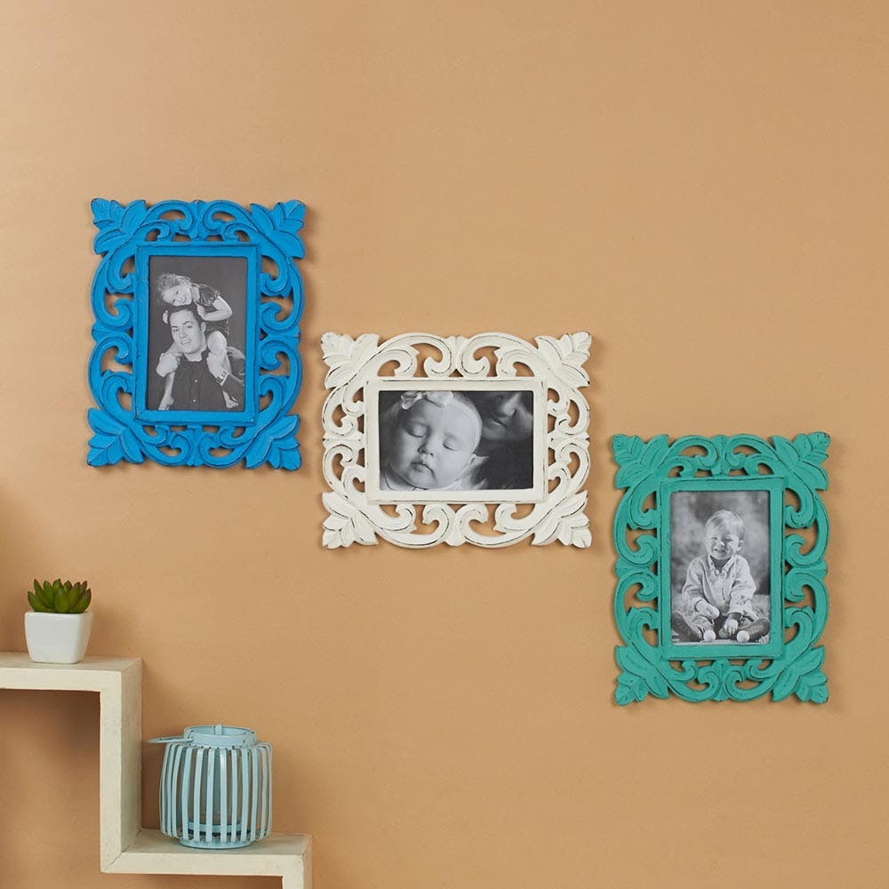 Wall,Picture frame,Blue,Turquoise,Teal,Room,Aqua,Visual arts,Rectangle,Pattern