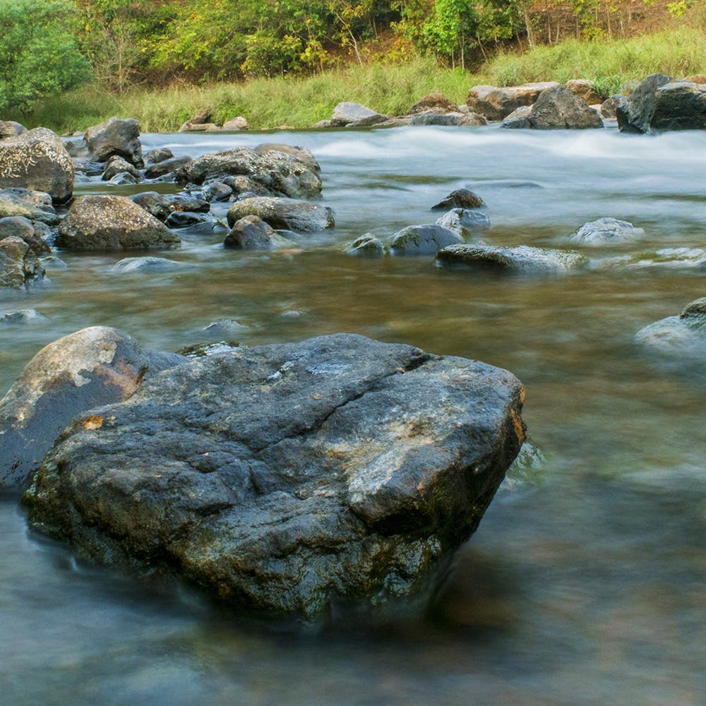 Body of water,Water,Water resources,Rock,Stream,Nature,Watercourse,River,Boulder,Natural landscape