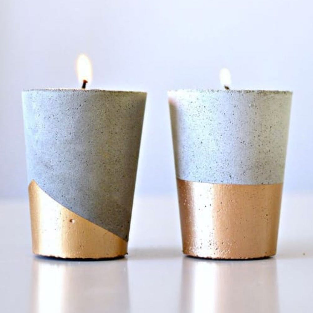 Candle,Lighting,Candle holder,Wax,Cylinder,Table,Interior design,Metal