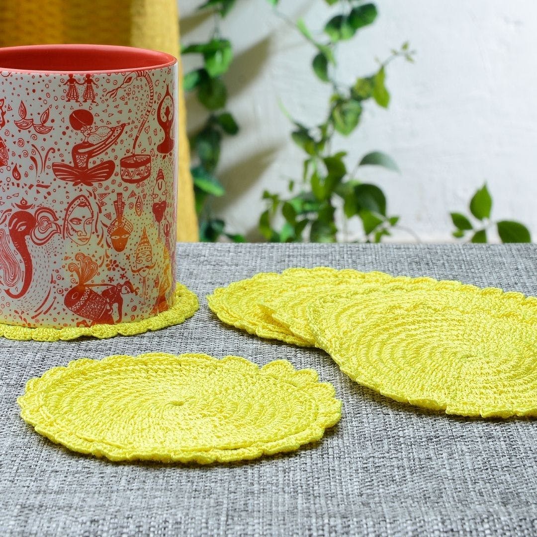 Yellow,Placemat,Leaf,Linens,Textile,Tablecloth,Tableware,Circle,Embroidery