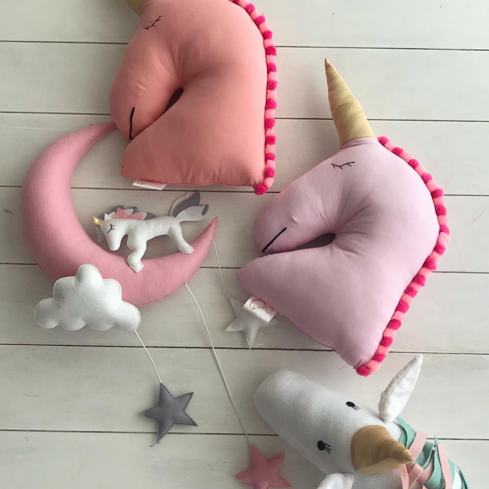 Pink,Ear,Neck,Fictional character,Tail,Elephant,Toy,Unicorn,Stuffed toy