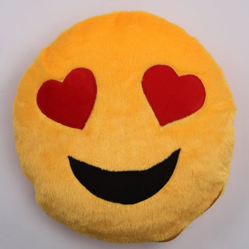 Facial expression,Yellow,Smile,Orange,Emoticon,Smiley,Textile,Mouth,Icon,Stuffed toy
