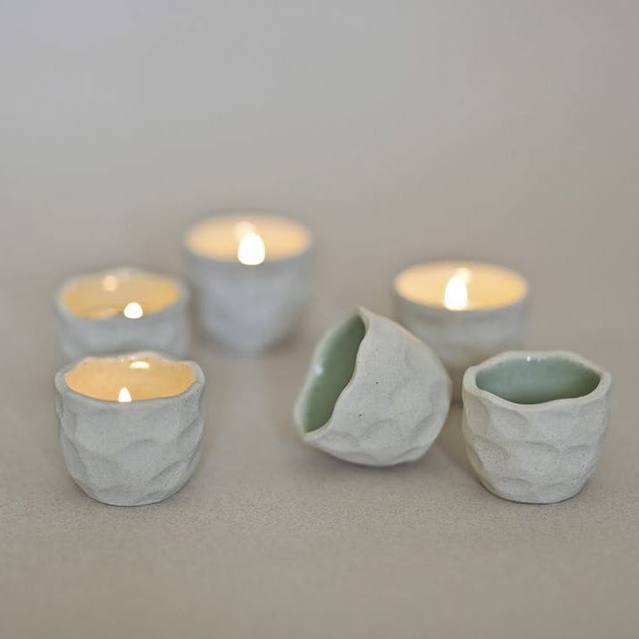 White,Lighting,Candle,Candle holder,Flameless candle,Ceramic,Porcelain,Interior design,Glass,Tableware