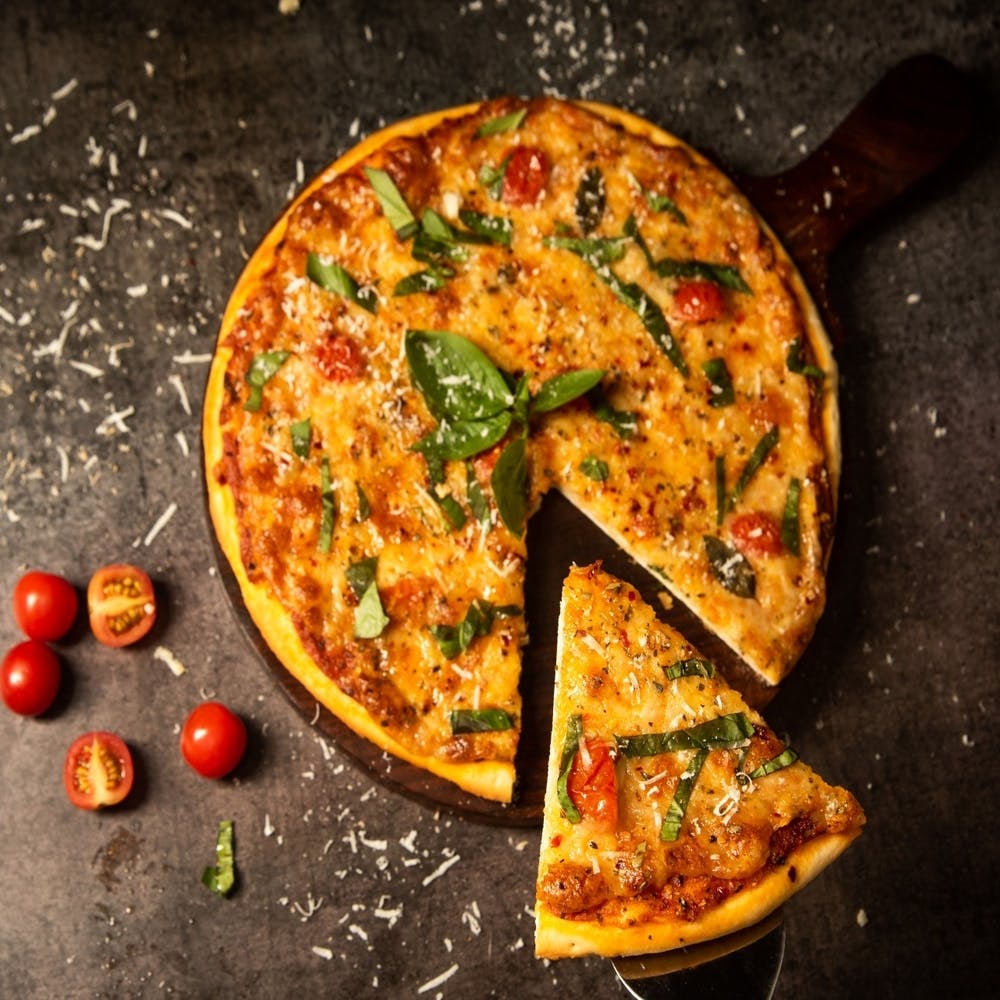 Dish,Food,Cuisine,Ingredient,Pizza,California-style pizza,Pizza cheese,Italian food,Frittata,Flatbread