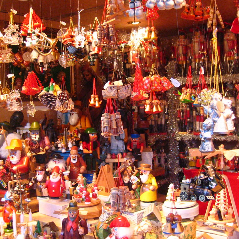 Market,Bazaar,Public space,Christmas ornament,City,Marketplace,Event,Souvenir,Crowd,Christmas decoration