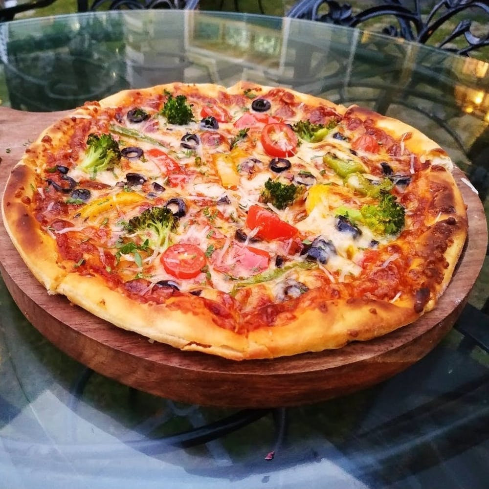 Dish,Food,Pizza,Cuisine,Pizza cheese,California-style pizza,Ingredient,Quiche,Sicilian pizza,Italian food