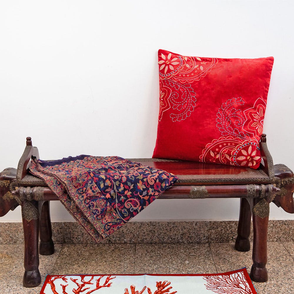 Red,Furniture,Cushion,Maroon,Pillow,Throw pillow,Creative arts,Velvet,Carpet,Linens