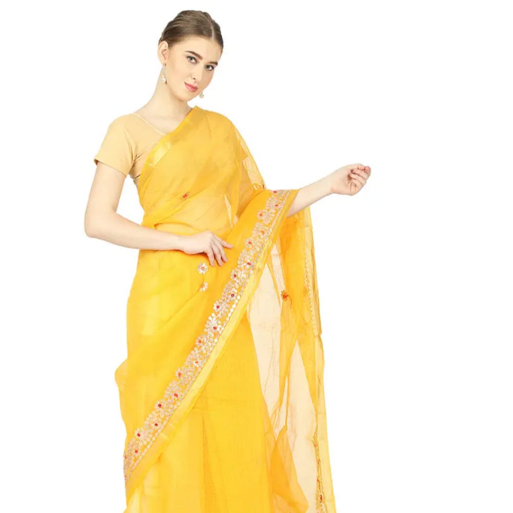 Yellow,Sleeve,Textile,Formal wear,Fashion,Sari,Silk,Gown,Fashion model,Costume