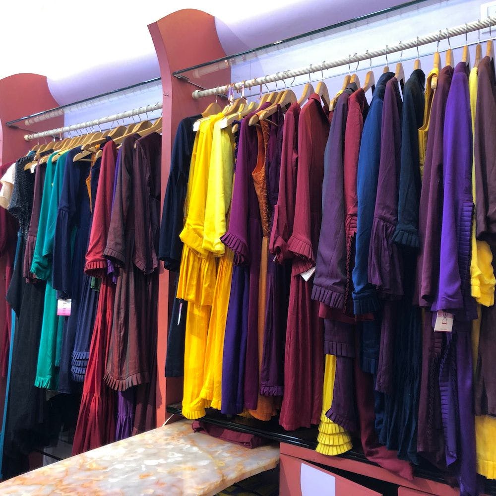 Textile,Purple,Clothes hanger,Lavender,Violet,Human settlement,Collection,Boutique,Outlet store,Retail