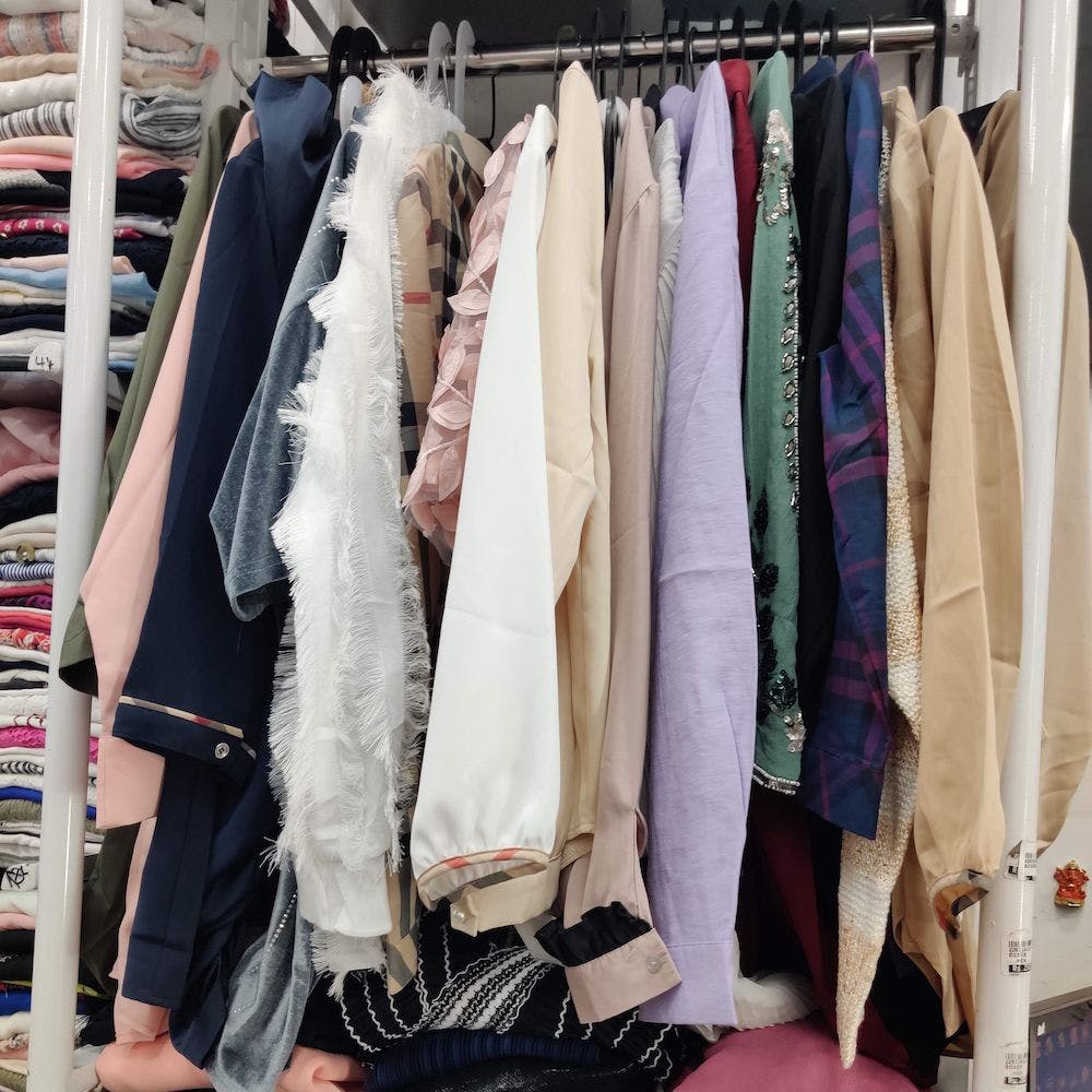 Textile,Room,Clothes hanger,Collection,Retail,Closet,Fashion design,Wardrobe