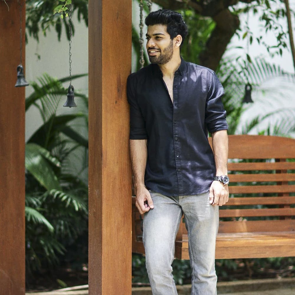 Bench,Sleeve,Trousers,Shirt,Denim,Jeans,Standing,Collar,Dress shirt,Sitting