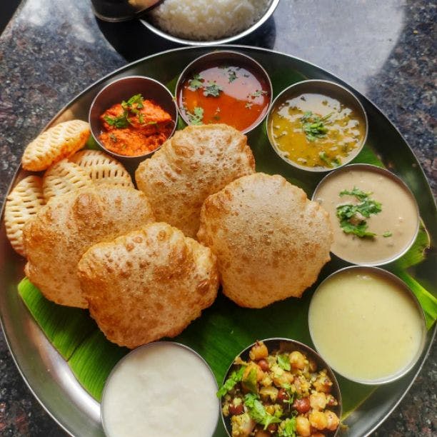 Dish,Food,Cuisine,Meal,Ingredient,Produce,Fried food,Indian cuisine,Vegetarian food,Puri