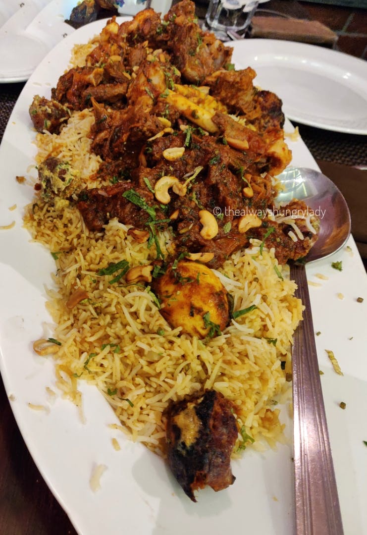 Dish,Food,Cuisine,Ingredient,Biryani,Kabsa,Hyderabadi biriyani,Rice,Meat,Staple food