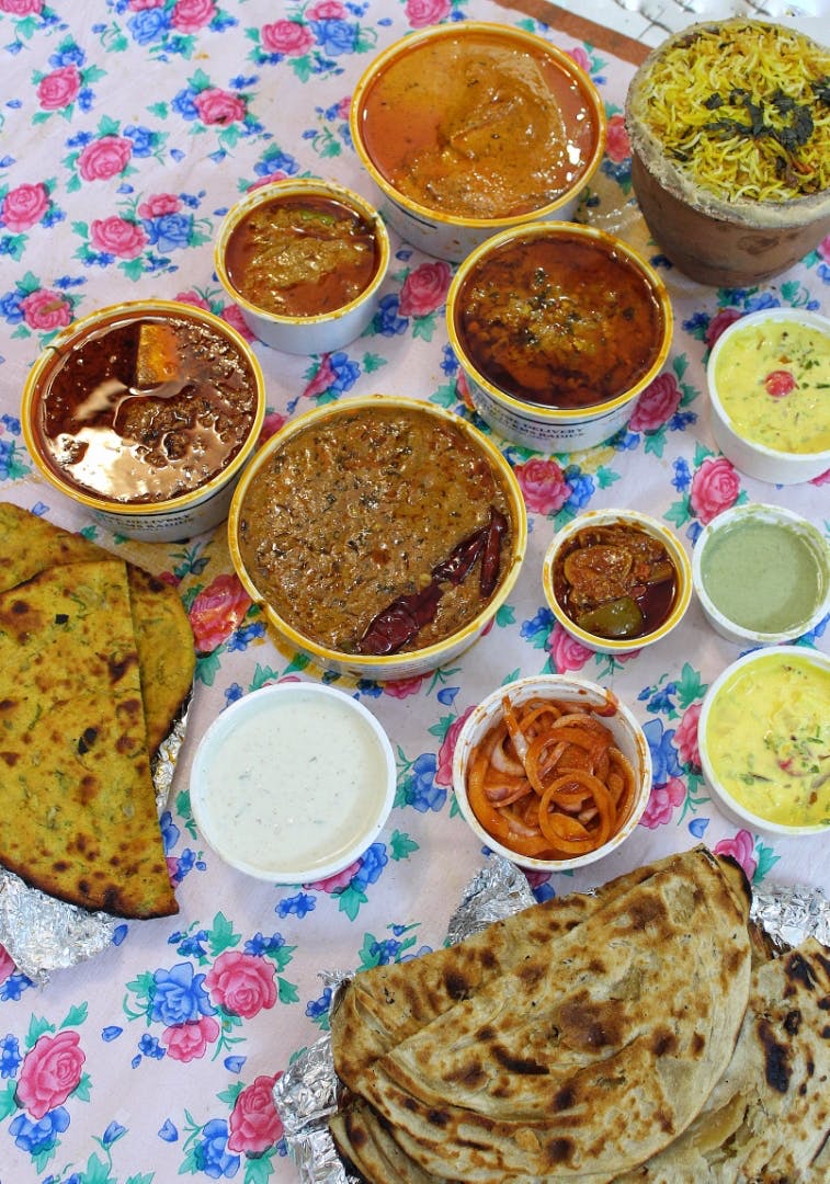 Dish,Food,Cuisine,Ingredient,Punjabi cuisine,Naan,Paratha,Sindhi cuisine,Indian cuisine,Roti