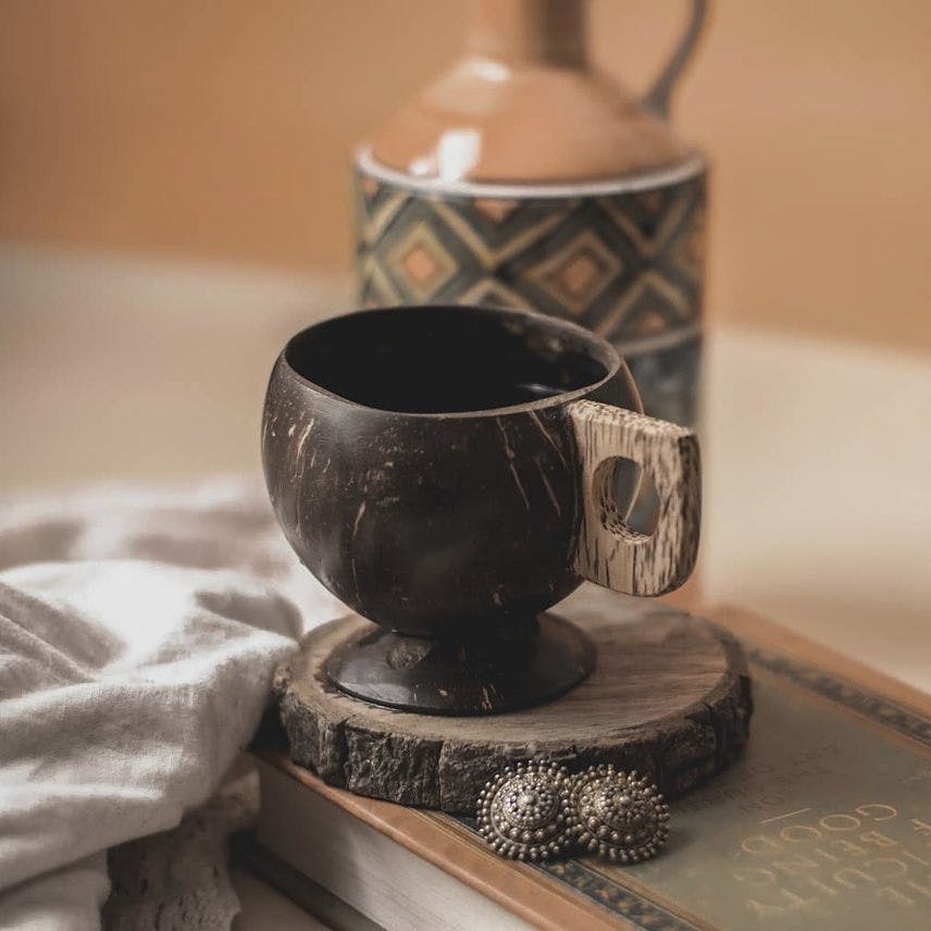 Serveware,Cup,Drinkware,Ceramic,Jewellery,Still life photography,Natural material,Pottery,Dishware,earthenware