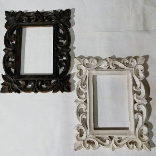 Brown,Makeup mirror,Rectangle,Font,Circle,Picture frame,Symmetry,Metal,Mirror,Pattern