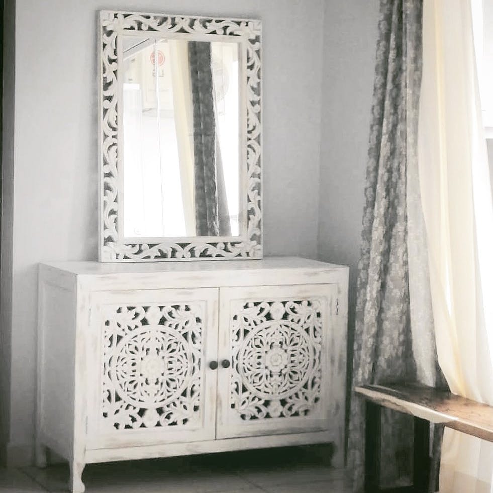 Mirror,Furniture,Cabinetry,Wood,Textile,Curtain,Interior design,Rectangle,Window,Floor