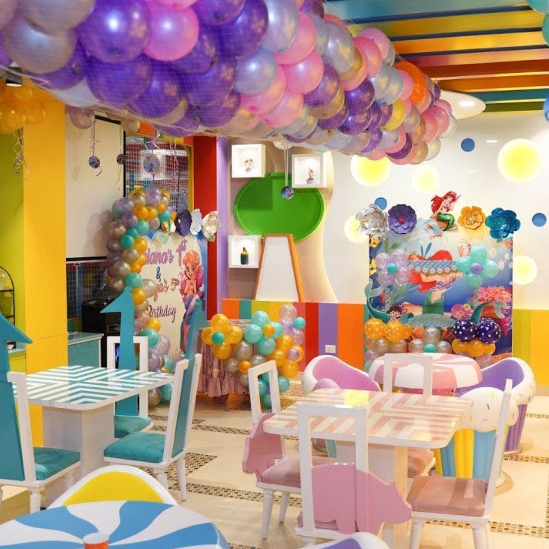 Decoration,Furniture,Chair,Blue,Product,Balloon,Yellow,Architecture,Pink,Party supply