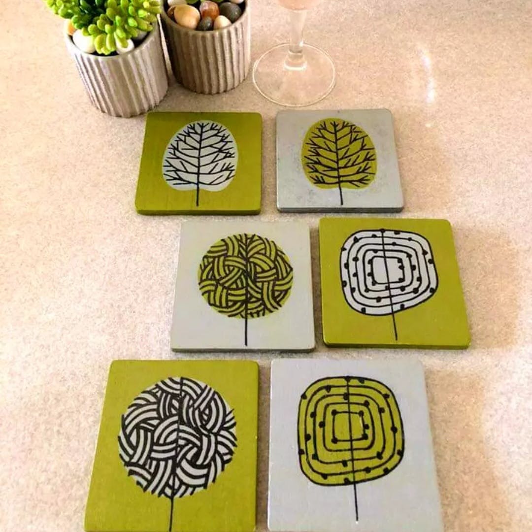 Green,Flowerpot,Houseplant,Yellow,Plant,Rectangle,Font,Creative arts,Pattern,Art