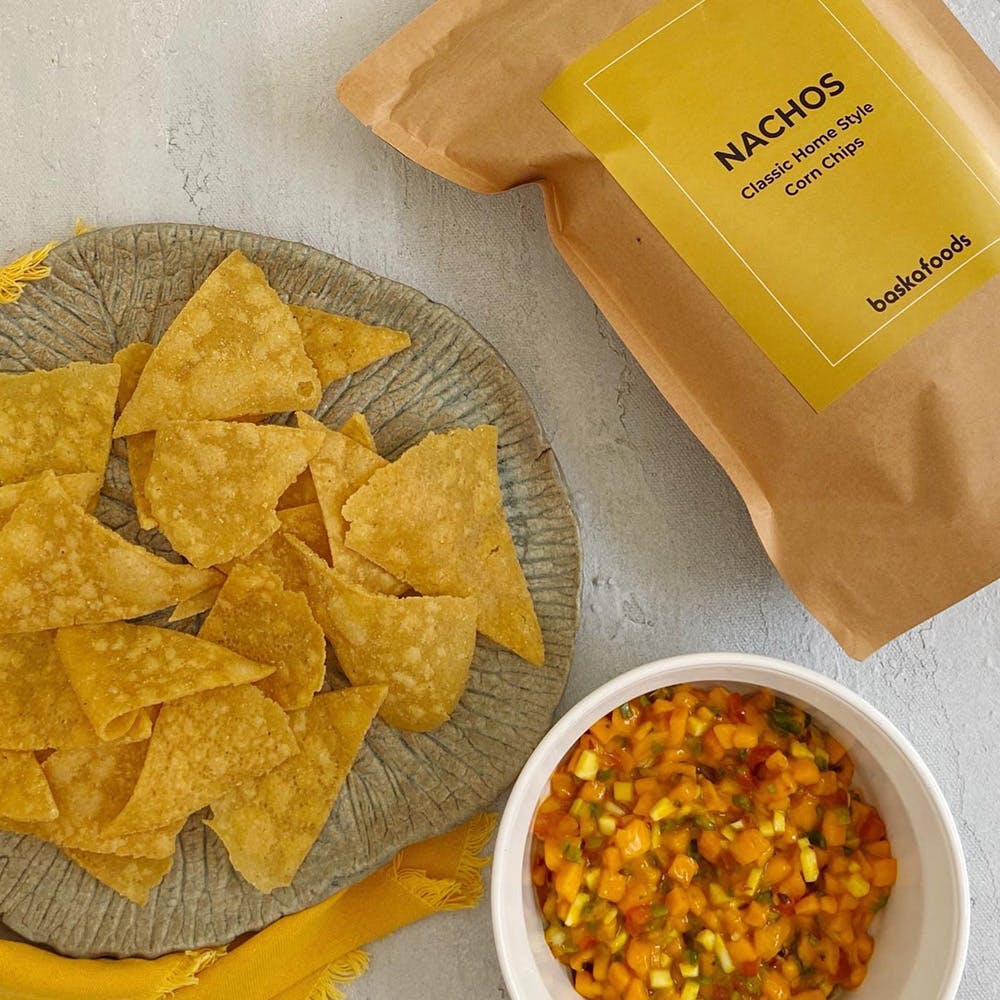 Food,Ingredient,Totopo,Corn chip,Recipe,Yellow,Cuisine,Dish,Tortilla chip,Tableware