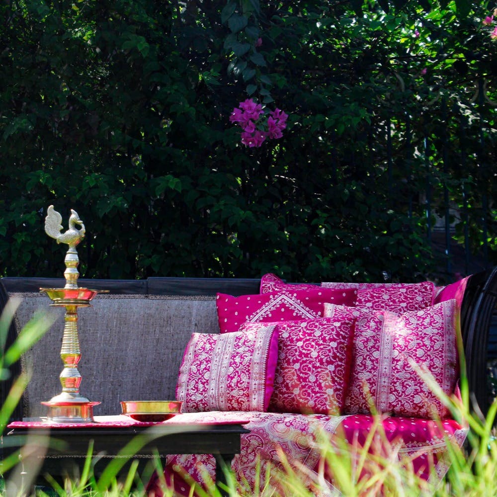 Plant,Purple,Botany,Outdoor furniture,Pink,Rectangle,Grass,Natural landscape,Couch,Shrub