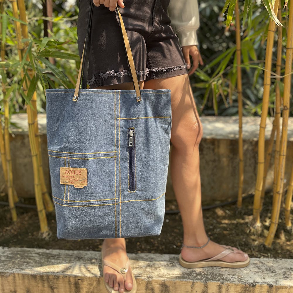 Clothing,Jeans,Shoe,Photograph,Leg,Tartan,Luggage and bags,Street fashion,Plant,Sleeve