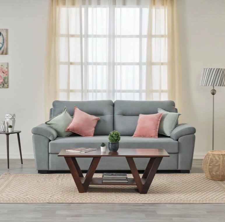 Couch,Furniture,Rectangle,Table,Picture frame,Wood,Interior design,Textile,Comfort,Window