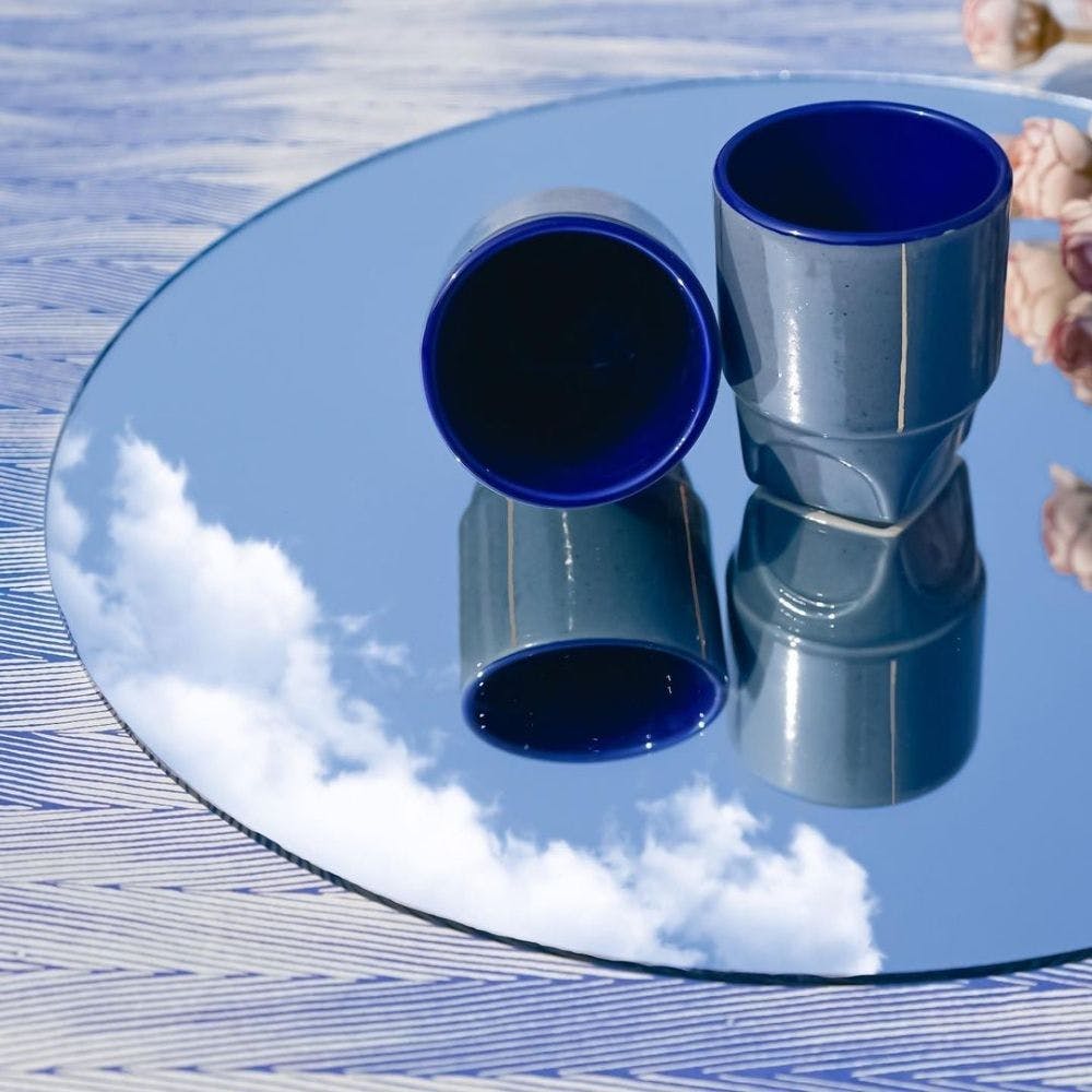 Drinkware,Cloud,Blue,Azure,Sky,Material property,Cylinder,Gas,Circle,Liquid