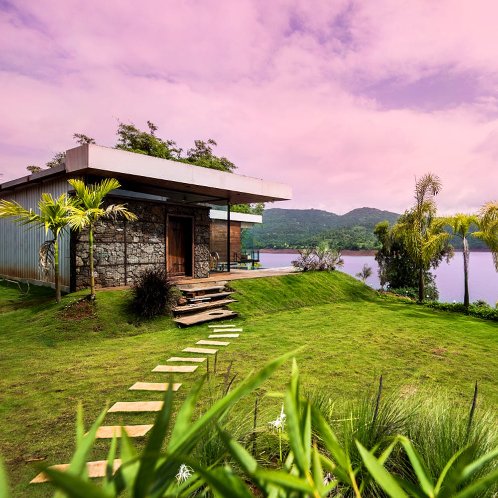 Cloud,Sky,Water,Plant,Building,Tree,Green,Natural landscape,House,Land lot