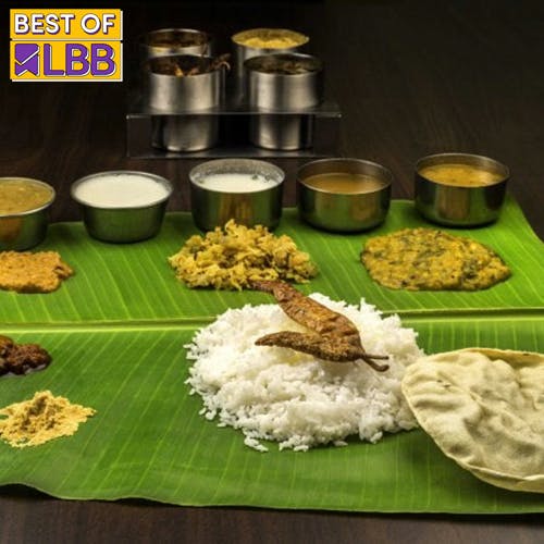 Food,Banana leaf rice,Tableware,White rice,Ingredient,Dal bhat,Green,Jasmine rice,Rice,Recipe