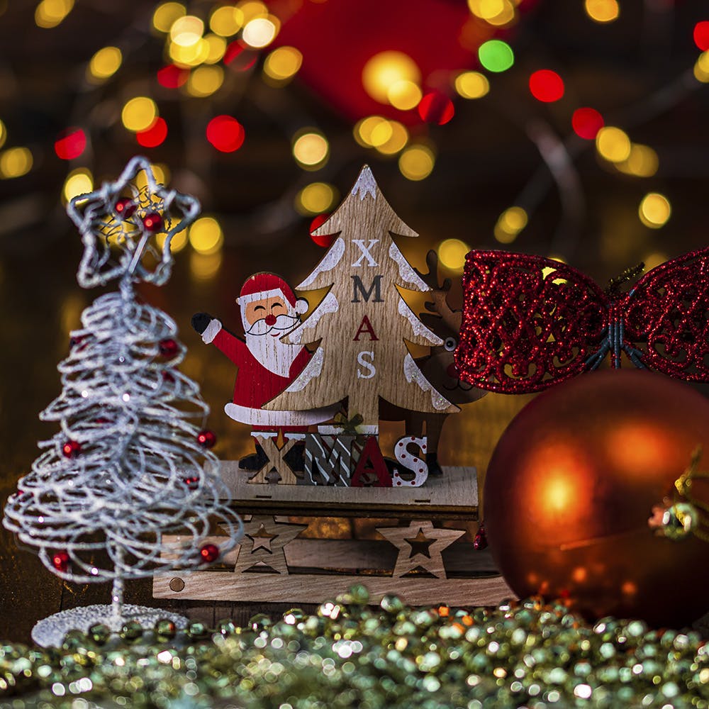 Christmas tree,Christmas ornament,Plant,Light,Holiday ornament,Decoration,Lighting,Ornament,Christmas decoration,Woody plant