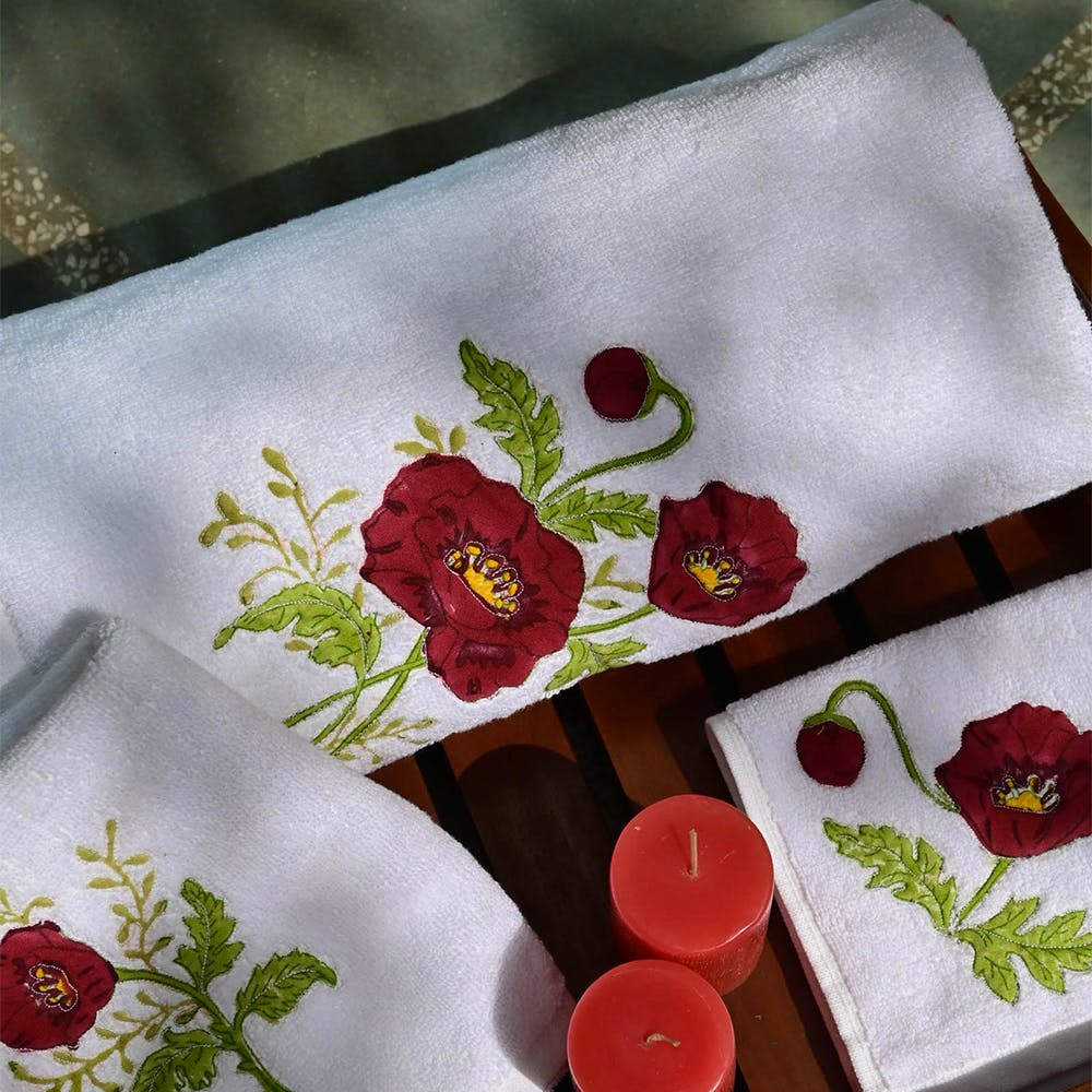 Flower,Dishware,Green,Petal,Textile,Rectangle,Tablecloth,Creative arts,Sleeve,Red