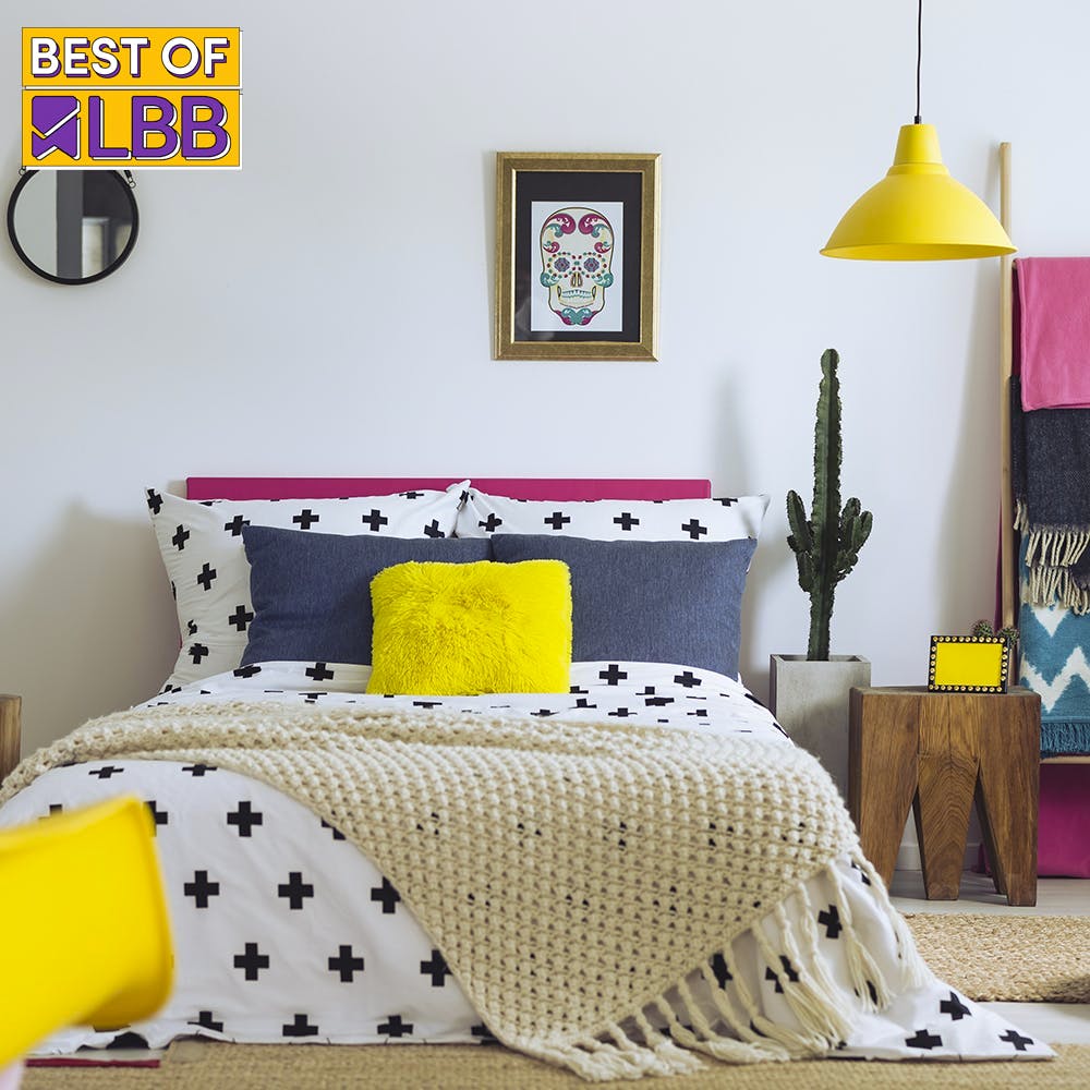 Furniture,Property,Comfort,Building,Textile,Bed frame,Interior design,Decoration,Rectangle,Yellow
